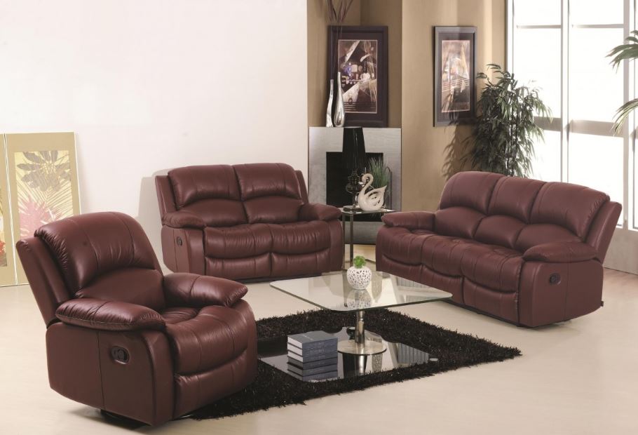 A tidy living room with brown leather sofas
